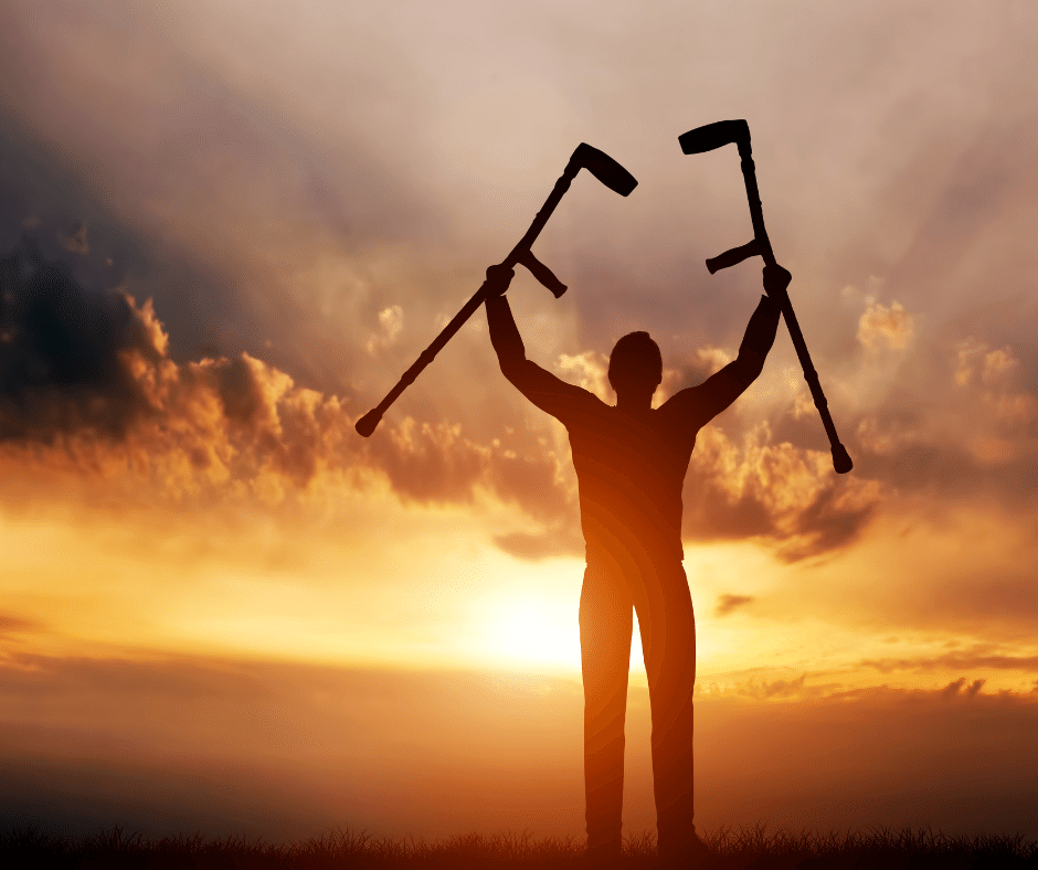 man standing up without crutches